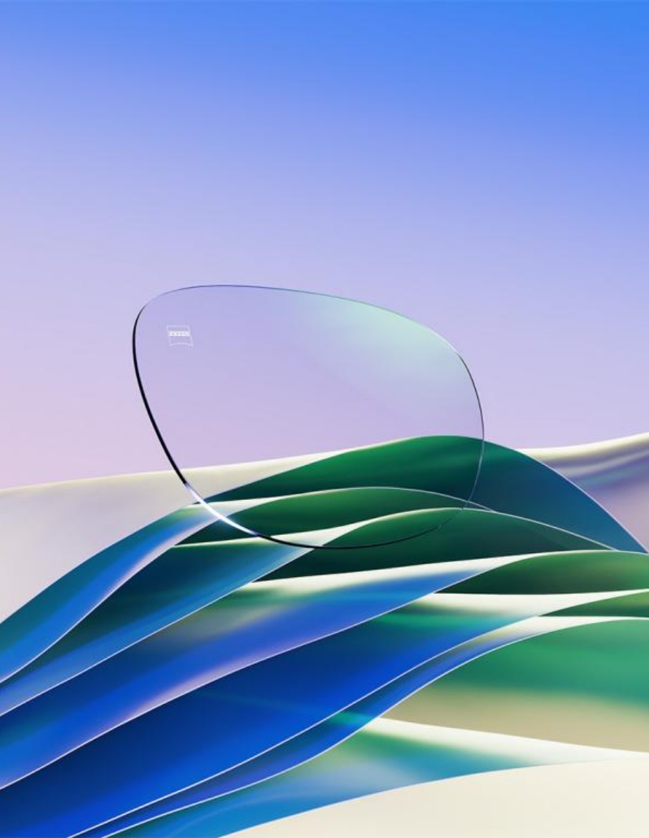 Brillenglas mit angedeuteten Schichten.